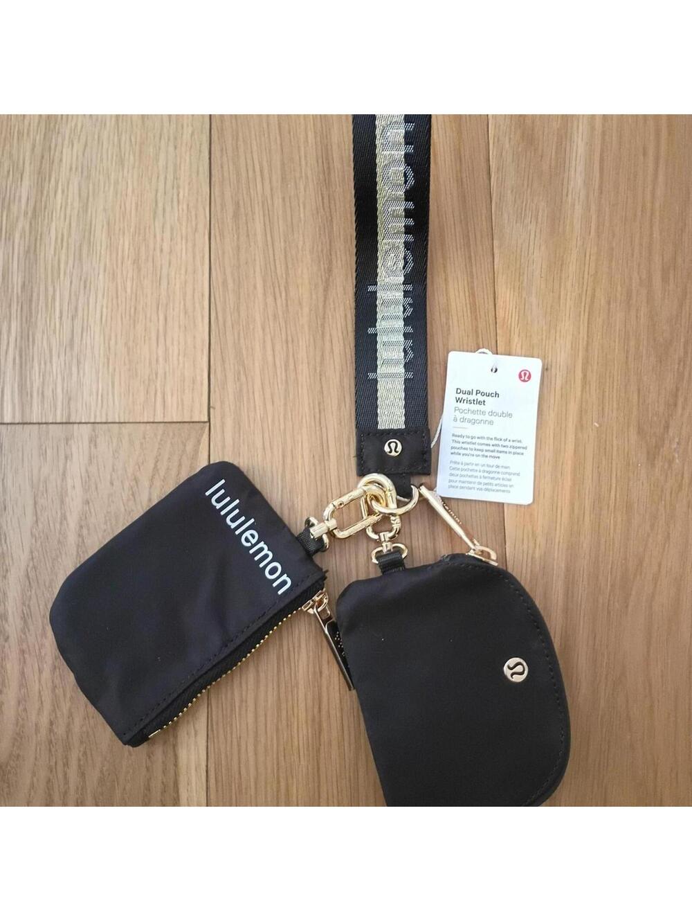 Lululemon Women's Black and Gold Dual Pouch Wristlet
